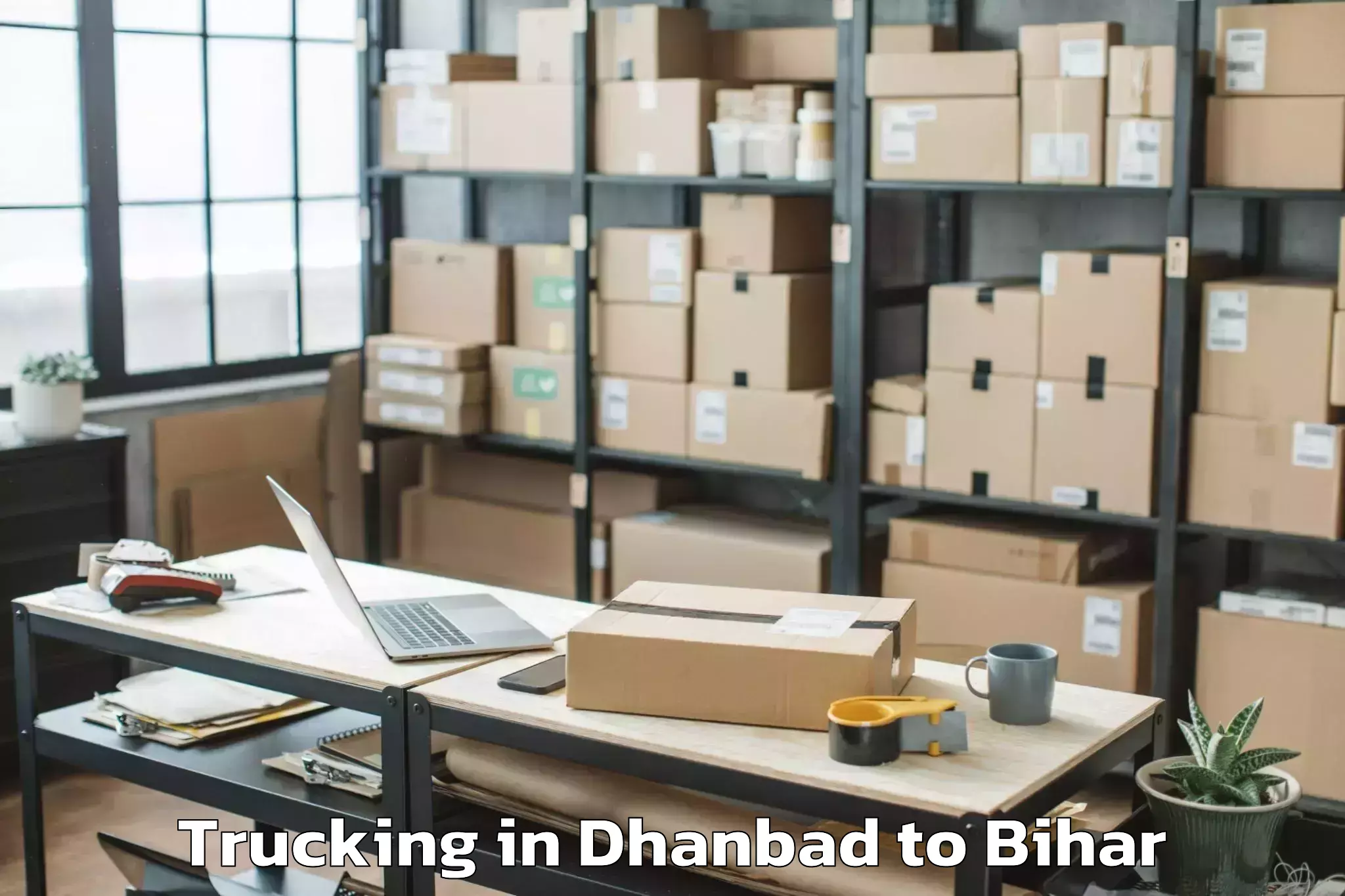 Get Dhanbad to Adhaura Trucking